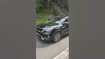 Kia Seltos On Hills Road ,Aurora Black Pearl color